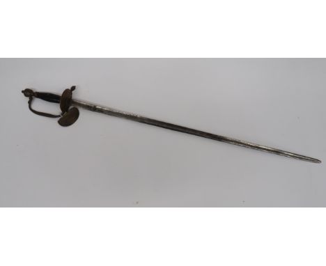 Infantry Officer’s 1796 Pattern Sword31 3/4 inch, single edged blade with large fuller.  Traces of foliage engraving.  Brass,