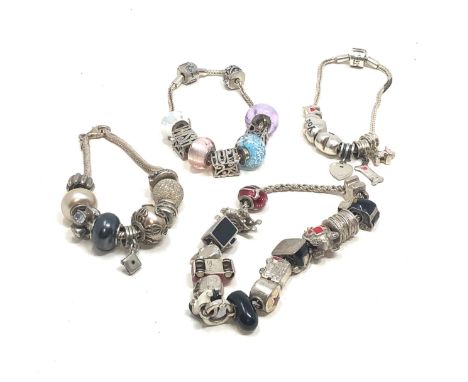 4 silver mixed brand charm bracelets &amp; charms