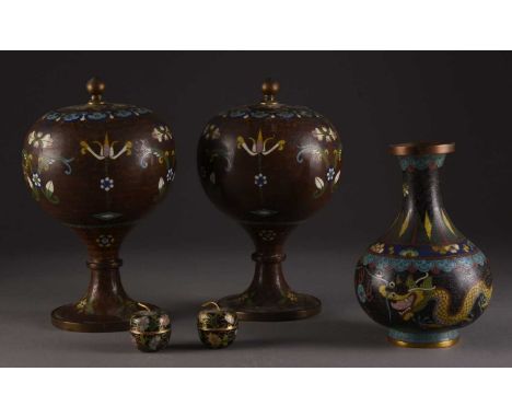 An assembled group of Chinese cloisonne, 19th-20th centuryIncluding: A pair of globe form footed vases and covers, 20cm high;