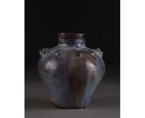 A Chinese Junyao vase, possibly Song DynastyOf ovoid form, the shoulder applied with Buddhist lion heads and studs in imitati