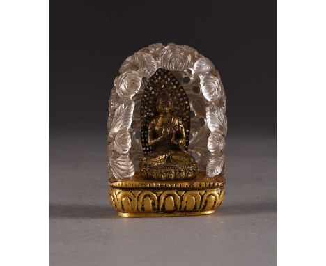 A Tibetan carved and parcel gilt rock crystal throne, 17th centuryCarved and pierced with scrolling branches issuing a canopy