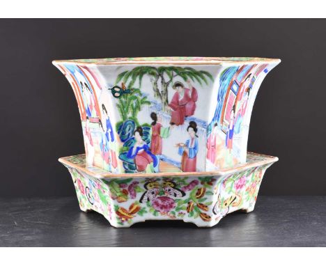 A Chinese Canton famille rose planter and stand, Qing DynastyOf hexagonal section, decorated with scenes of noble figures at 