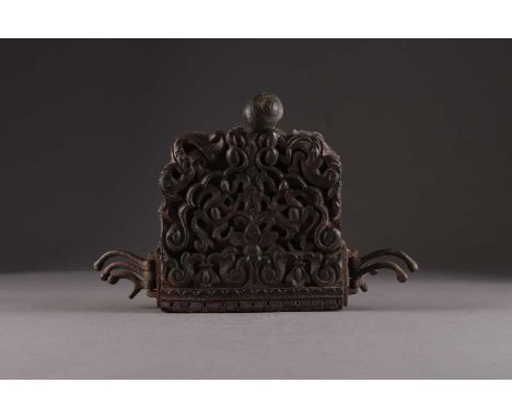 A carved wood architectural fragment, India19th century and later, carved with stylised flowers and scrolling foliage, with l