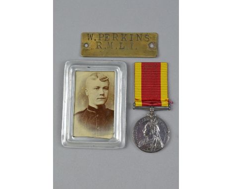 A CHINA WAR MEDAL, no bar, correctly named to W. Perkins, Privat R.M.L.I. (Royal Marine Light Infantry), together with almost