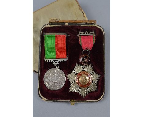 OLD SILK LINED BOX, containing two Turkish/Otterman medals, Medjidie Order, believed silver grade, complete with ribbon and p