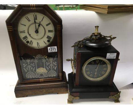 A slate mantle clock of classical style with Roman numerals together with a mahogany cased mantle clock with visible pendulum
