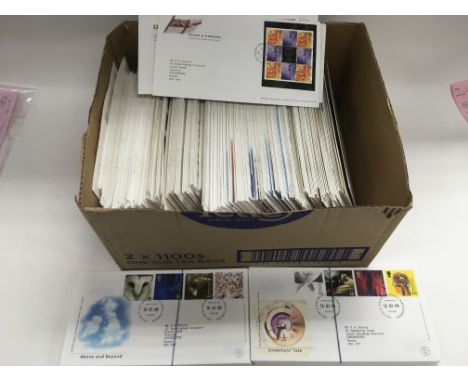 A box of GB first day covers, mostly from 2000 onwards.