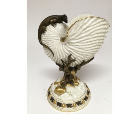 A Royal Worcester nautilus shell vase with gilded coral reef decoration, circa 1881.