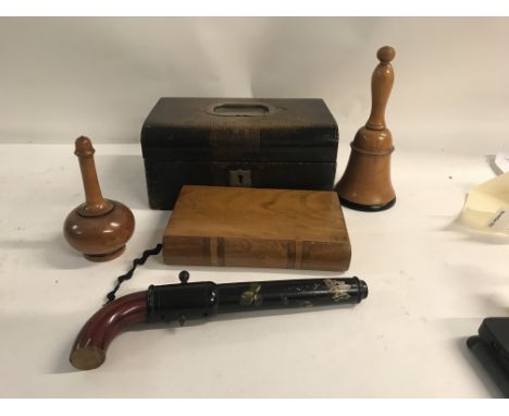 A Collection of tureen comprising powder flask, bell flask , book, pencil case in the form of a pistol.