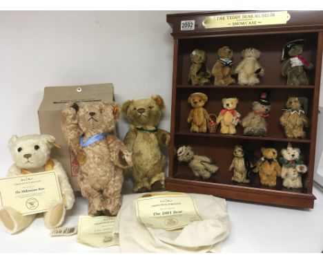 Three Steiff annual bears. The Millennium bear, 2001 and 2002 bear with certificates a dust bag and box and a Teddy Bear Show