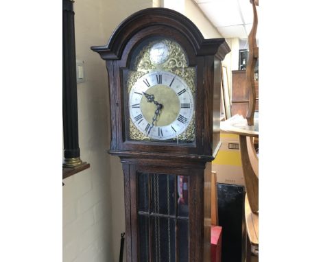 An oak long case clock with a gilt dial silvered chapter ring visible weights and pendulum - NO RESERVE