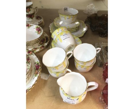 A Royal Albert six place setting tea set, one cup missing.
