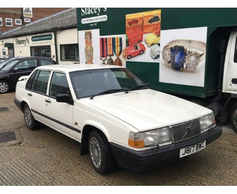 A Volvo 940 SE Auto Petrol 2litter four door Saloon car Registration J817 BWC finished in white the rear boot with spoiler. T