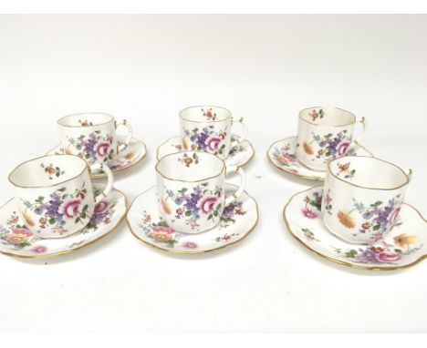 A Royal Crown Derby porcelain tea set the Derby Posies. Six cups and saucers one stained cup otherwise no obvious damage.