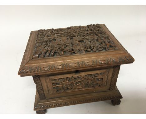 A Chinese early 20th century carved sandalwood trinket box (one foot missing) 20x15cm.