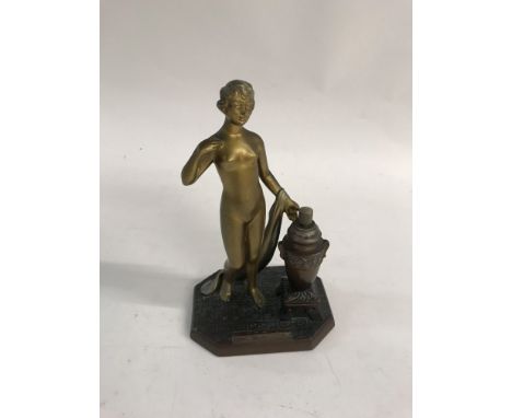 A Art Deco style Table lighter in the form of a nude maiden.