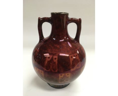 A Pilkington Lancastrian lustre vase, damaged handle, approx height 16.5cm.
