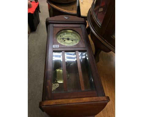 A wall clock with Arabic numerals - NO RESERVE