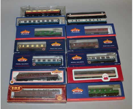 OO Gauge. 10 boxed Coaches including 8 by Bachmann, a GMR BR maroon Class B Suburban and a Dapol BR Inter-City Mk IID (Open 2