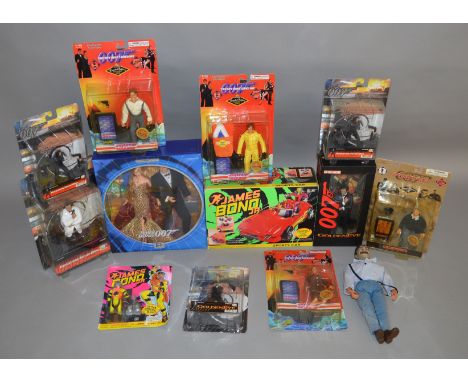 A mixed group of James Bond 007 related Action Figures, mostly in original packaging,&nbsp; including a boxed Ken and Barbie 