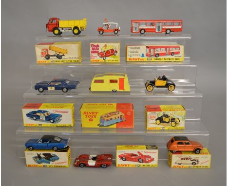 9 boxed Dinky Toys including 117 Four Berth Caravan, 252 Pontiac RCMP car, 283 Red Arrow Bus amd 350 Tiny's Mini-Moke. Overal