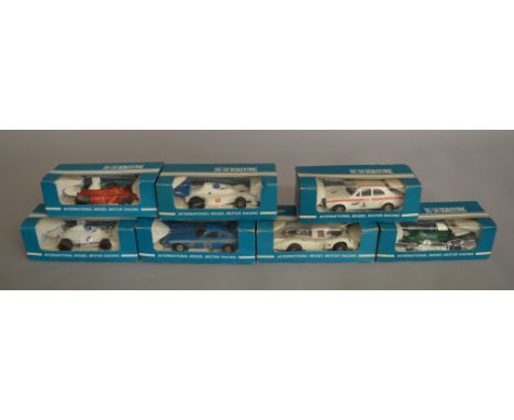 7 boxed Scalextric slot cars in 'Rovex' blue and white window box packaging including C124 Ferrari, C053 Datsun 260Z, C.012 S