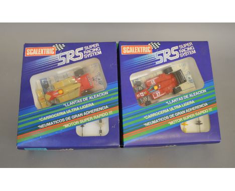 2 boxed Scalextric SRS slot cars, C.020 MacLaren F1 MT4/2B and C.021 Ferrari F1 156/85.&nbsp; (2)