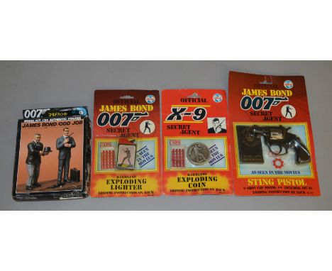 3 carded James Bond 007 toys by 'Coibel', made in Spain,  including 'Harmless Exploding Coin', Sting Pistol and Harmless Expl