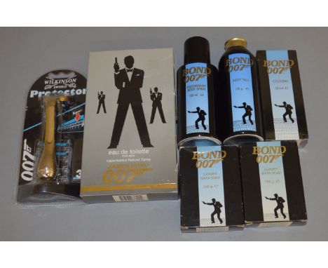 A quantity of James Bond 007 related items including Bath Soap, Wilkinson Sword Protector Razor in unopened packaging, Cologn