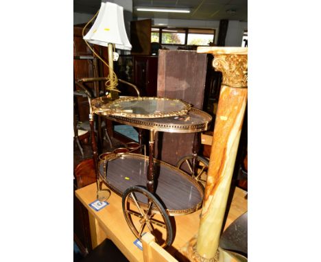 AN ONYX AND BRASS CORINTHIAN COLUMN TORCHERE STAND, together with a coppered tea trolley, table lamp and a gilt metal mirror 
