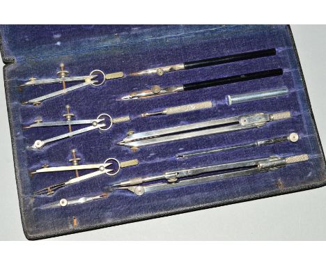 A VINTGE CASED GEOMETRY DRAUGHTSMAN DRAWING SET, to include compasses etc