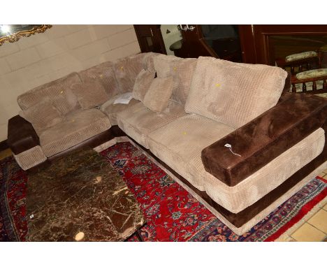 A BROWN SUEDE AND UPHOLSTERED TWO PIECE LOUNGE SUITE, comprising of a large four seater corner sofa, length 295cm x 209cm and