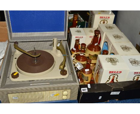 A DANSETTE MAJOR PORTABLE RECORD PLAYER, together with a box of Bell's whisky decanters, some boxed and includes Royal commem
