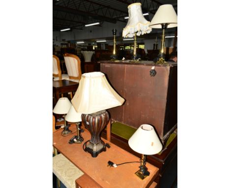 A DECORATIVE TABLE LAMP with shade together with six various brass table lamps (7)