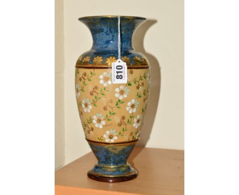 A ROYAL DOULTON STONEWARE VASE, florally decorated, impressed backstamp and impressed No536 and 7205, height 27cm