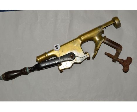 A VINTAGE ACME BRASSED STEEL AND IRON BAR BOTTLE OPENER, turned wooden handle
