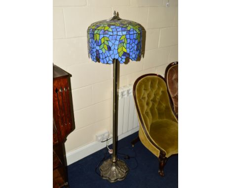 A TIFFANY STYLE STANDARD LAMP with a blue and green ground shade, height 152cm
