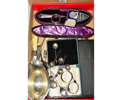 A CASED SET OF SIX GEORGE V SILVER BEAN END COFFEE SPOONS, Birmingham 1934, two circular silver napkin rings, a child's silve