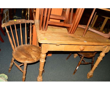 A VICTORIAN PINE KITCHEN TABLE with a single drawer, width 110cm x depth 74cm x height 80.5cm, and two circular seated stick 