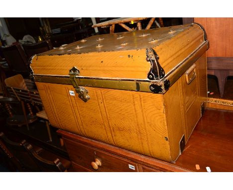 A TAN PAINTED TIN TRUNK