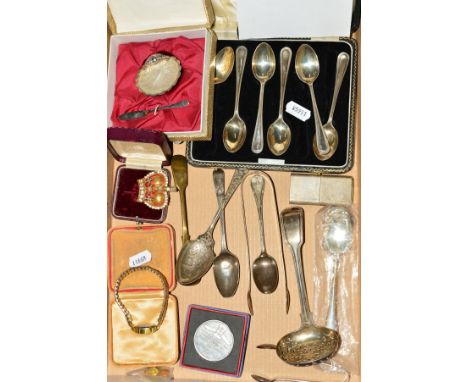 A PAIR OF GEORGE III SILVER BRIGHT CUT SUGAR TONGS, repaired at bow, maker Tl, Sheffield 1798, a silver cased 'The Howitt Lig