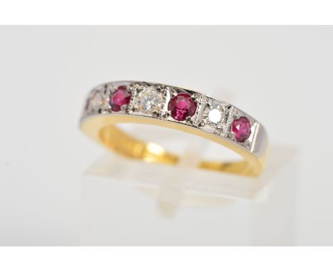 AN 18CT GOLD RUBY AND DIAMOND SEVEN STONE RING, designed as a row of four graduated circular rubies interspaced by three bril