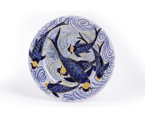 Peggy Bullock for Maling: a shallow carp dish, 1931, tube lined and picked out in blue and yellow with swimming carp, the rev