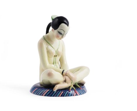 "Odalisque": a Lenci earthenware figural box lid, modelled as a nude oriental girl with long black ponytail and green necklac