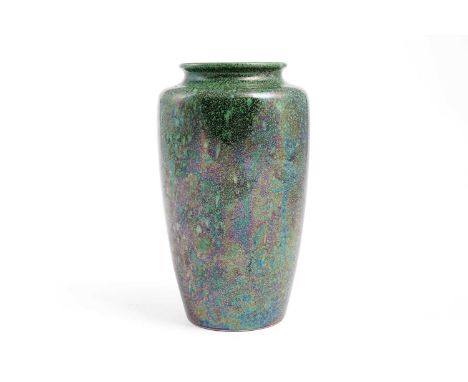 A Ruskin shouldered ovoid vase, 1911, with mottled iridescent green glaze, impressed 'Ruskin Pottery 1911', 21cms.