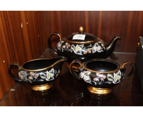 A VICTORIAN STYLE THREE PIECE CERAMIC TEA SERVICE