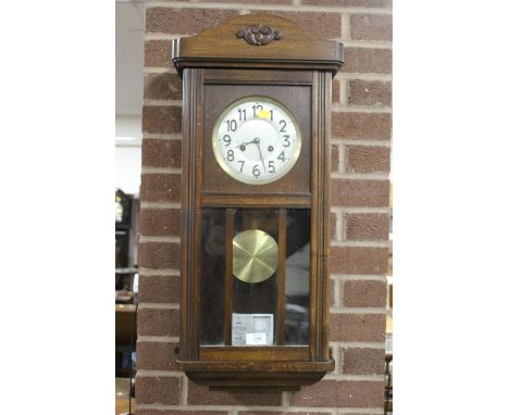 A VINTAGE WALL CLOCK