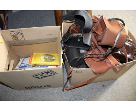 A SMALL BOX OF ORDNANCE SURVEY MAPS TOGETHER WITH A BOX OF VINTAGE CAMERA CASES