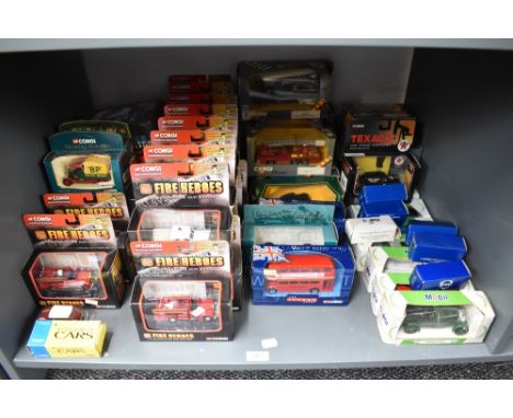 A shelf of modern Corgi diecasts including Fire Heroes, Mobil, Texaco, Double Nine limited editions etc, 50+ all boxed