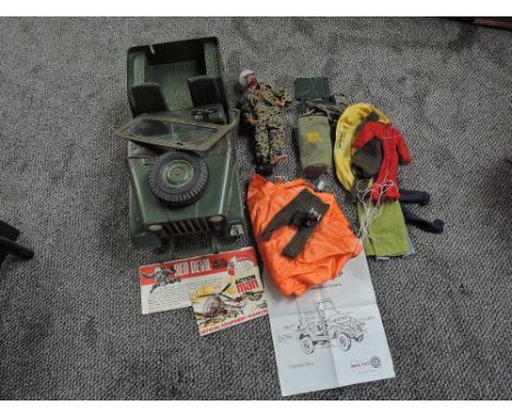 A 1960's Palitoy Action Man Red Devil Free Fall Parachutist with accessories and leaflet along with a Marx Command Patrol Arm